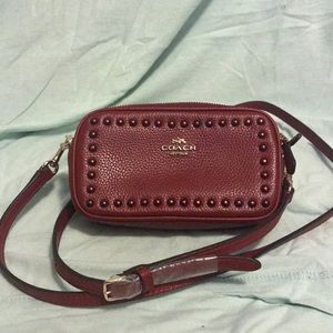 Red COACH clutch with adjustable shoulder strap!